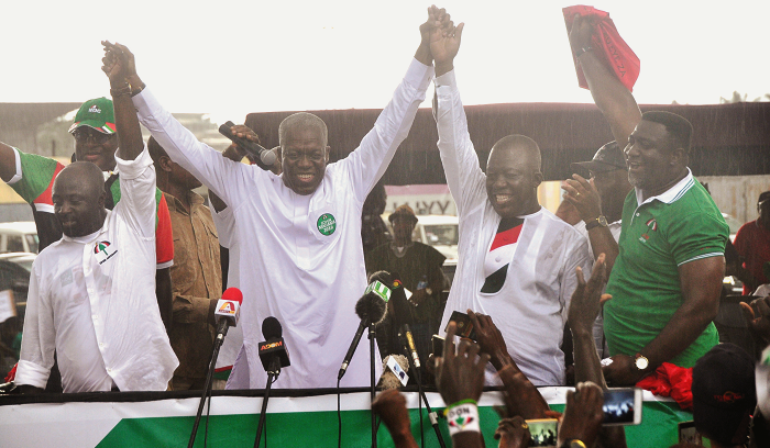 Vice President Amissah-Authur (middle) raises the hands of Mr Richard Ofori Agyemang (left) and Mr John Alexander Ackon at a joint campaign launch. Picture: EMMANUEL BAAH Vice President Amissah-Authur (middle) raises the hands of Mr Richard Ofori Agyemang (left) and Mr John Alexander Ackon at a joint campaign launch. Picture: EMMANUEL BAAH